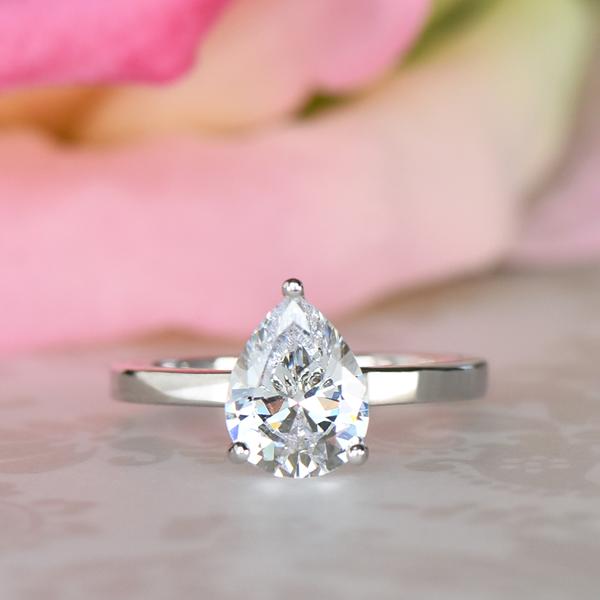 Solitaire pear clearance cut engagement rings